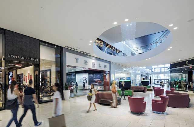 storefronts in a corridor with interior shopping at dadeland mall miami florida