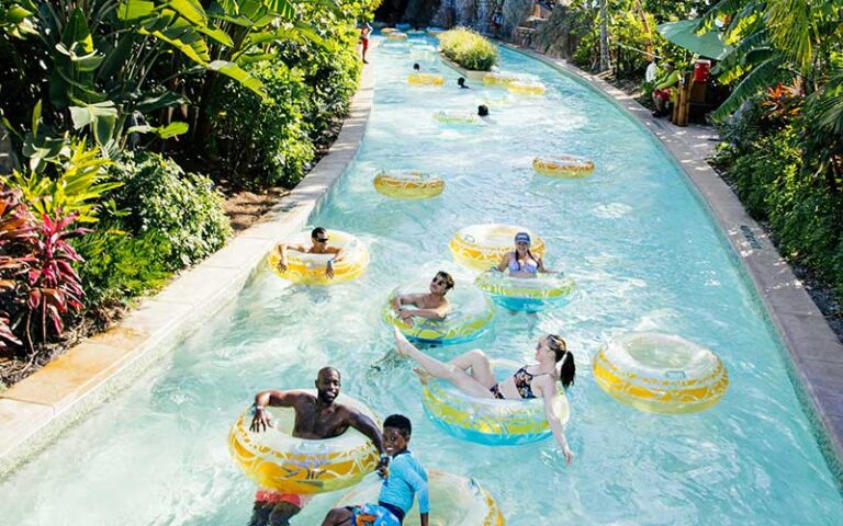 tubers on lazy river emerging from cave at universal volcano bay orlando
