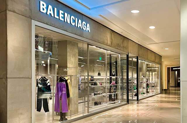 upscale mall area with balenciaga storefront in background at aventura mall florida