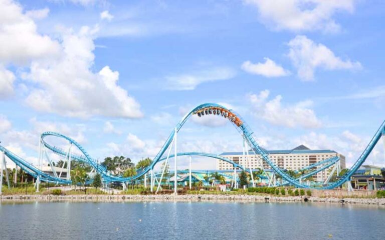 view across lake of twisting roller coaster at seaworld orlando