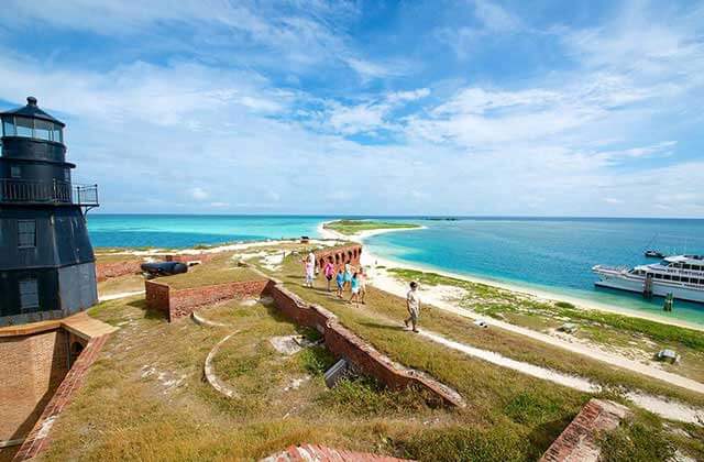 view of the fort wall and beach area at dry tortugas national park ferry key west
