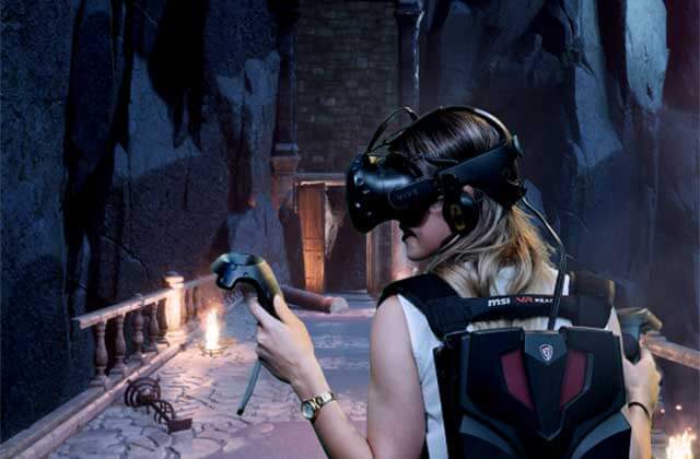 woman wearing a vr headset playing game at xtreme action park ft lauderdale