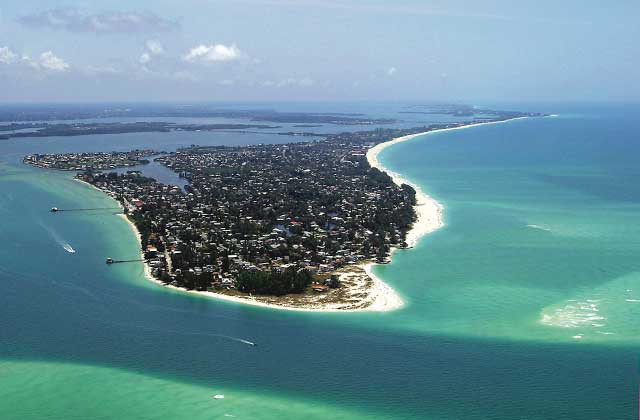 aerial view with blue ocean sand bars inlet beaches at anna maria island destination feature