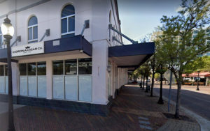 exterior downtown storefront with awning sign for corona cigar company sarasota