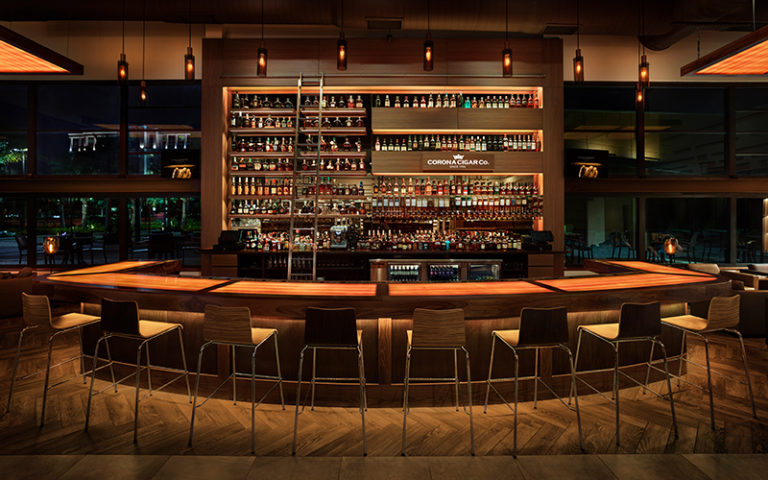 interior of cigar and liquor bar with wood decor at corona cigar company tampa