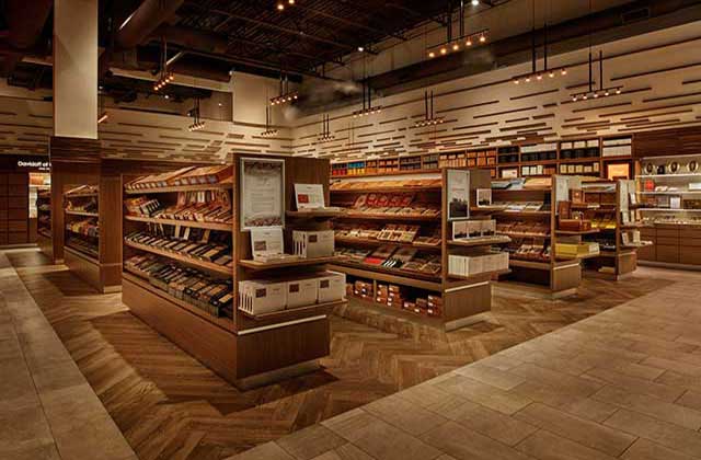 interior of store with shelves and rows of cigars and tobacco products at corona cigar company tampa