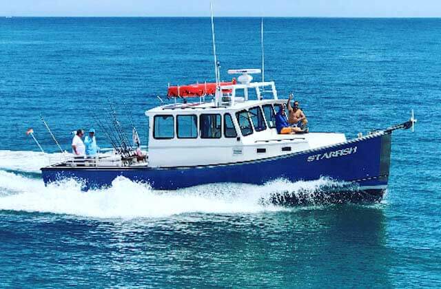 blue small fishing boat speeding along at princess fishing fleet cape canaveral