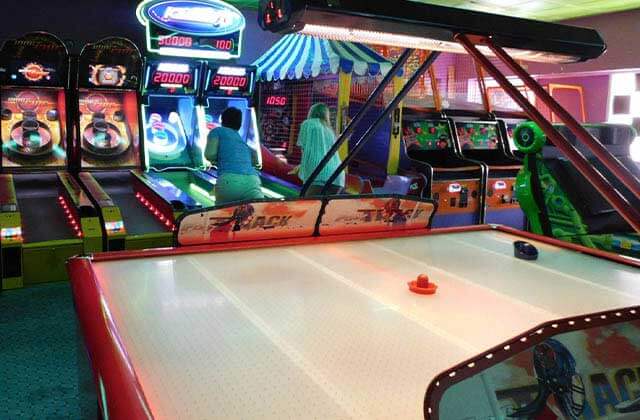 skee-ball hoops and air hockey games in arcade at kissimmee go karts florida