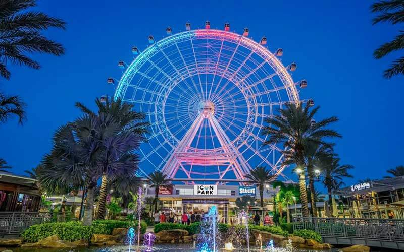 the wheel at icon park at night from businesses still open header