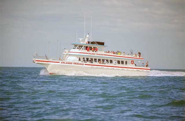 white and red fishing boat on the open sea at princess fishing fleet cape canaveral