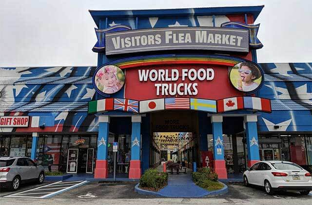 front exterior entrance outdoor of visitors flea market and world food trucks kissimmee