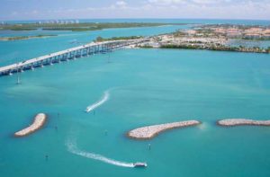 inlet and bay area with bridge boats jetties beachfront condos at st lucie destination feature
