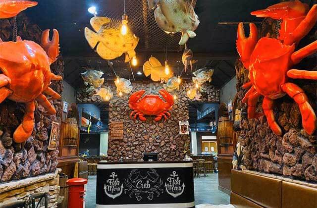lobby of restaurant with rock nets and crab decor at mr mrs crab juicy seafood bar kissimmee