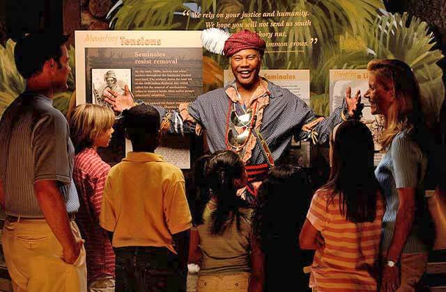 native american in period costume speaks to kids at orange county regional history center orlando