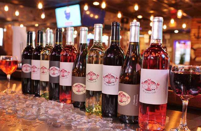 row of house wines along bar at mr mrs crab juicy seafood bar kissimmee