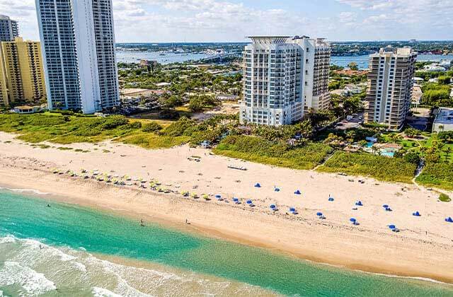 aerial view of beach with high rises and inlet at south east beaches