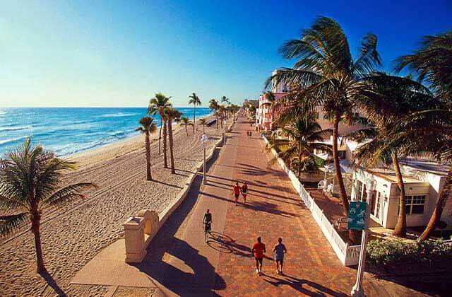 aerial view of beach walkway with houses and palm trees at fort lauderdale beaches