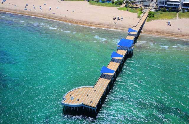 aerial view of partially covered pier and beach at fort lauderdale beaches