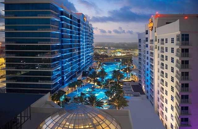 exterior aerial of two high rise buildings with pools at seminole hard rock hotel casino tampa