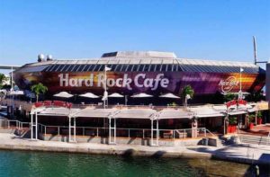 exterior on waterfront of coliseum style building at hard rock cafe miami