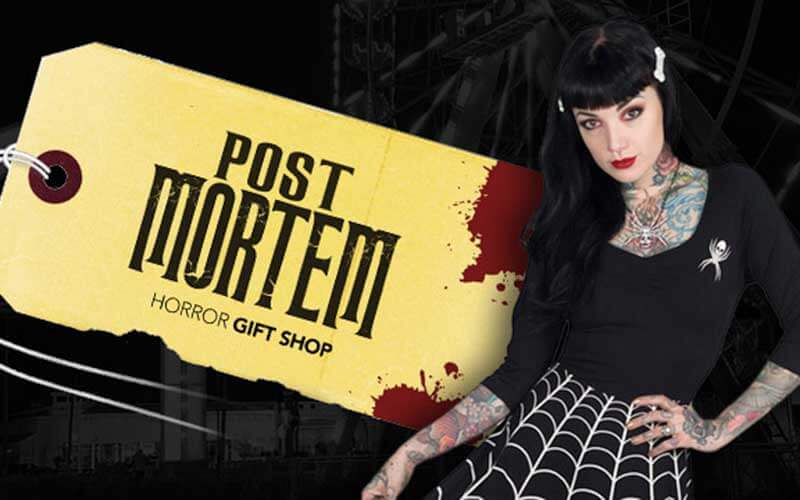 gothic girl posing next to sign on bloody toe tag for post mordem horror gift shop in new bootique post