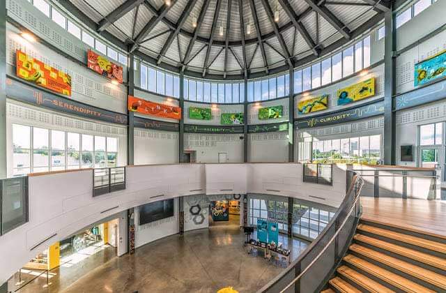 interior atrium rotunda with staircase and arching artwork at cade museum for creativity invention gainesville