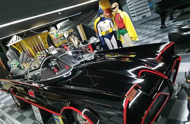 batmobile from the tv series with batman and robin statues at tallahassee automobile museum florida