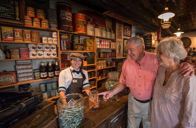 elderly couple shop in an old timey store at oldest store museum experience st augustine