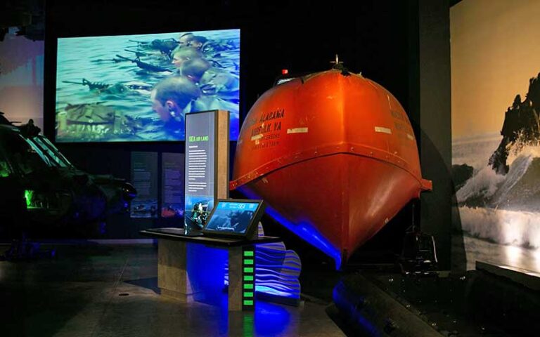 exhibits with orange tender boat at national navy udt seal museum fort pierce