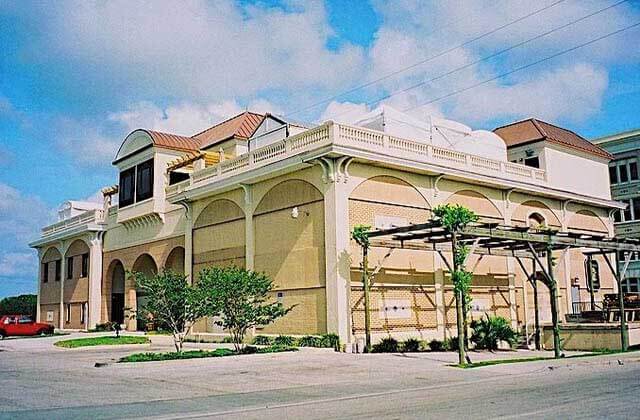 exterior of building with vine trellis at san sebastian winery st augustine