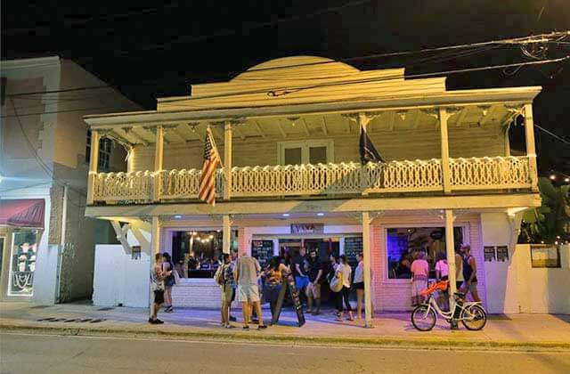front exterior two story restaurant at night at viva argentinean steakhouse key west