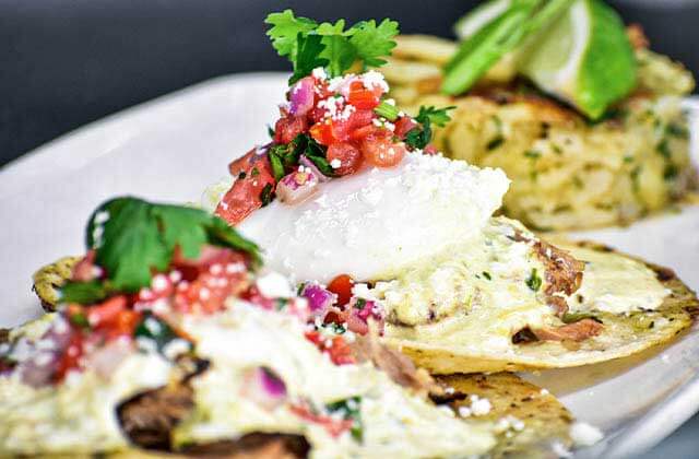 gourmet seafood entree with colorful toppings at salt cracker fish camp clearwater
