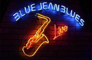 live with sax neon sign at blue jean blues fort lauderdale