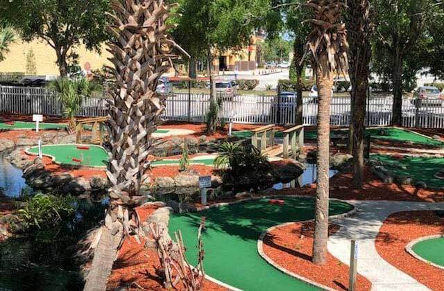 outdoor mini golf course with palm trees at easy street by funworks ocala