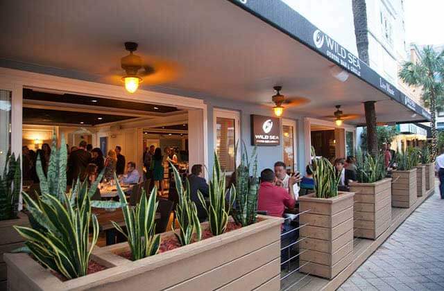 patio seating area of restaurant on sidewalk at wild sea oyster bar grill ft lauderdale