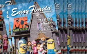 stack of enjoy florida magazine covers with characters from despicable me universal ride
