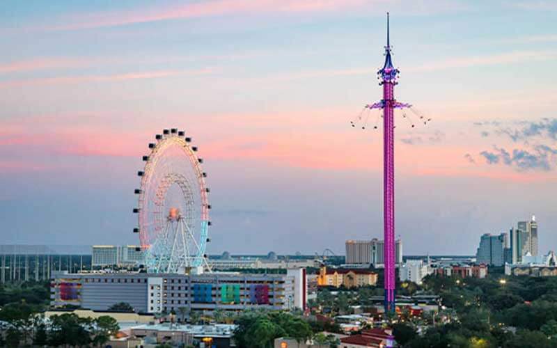 twilight aerial view of icon park with the wheel and starflyer