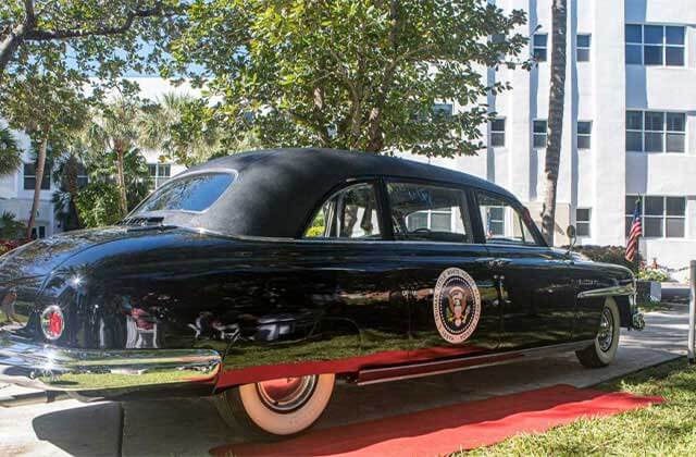 black classic car with limousine style from motorcade with presidential seal at harry s truman little white house key west