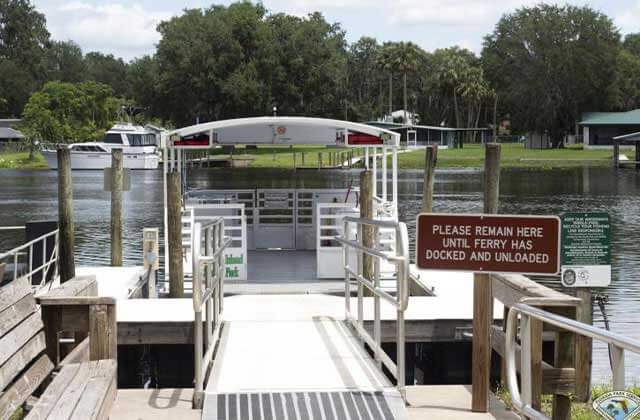 inlet river ferry dock with boats at hontoon island state park deland florida