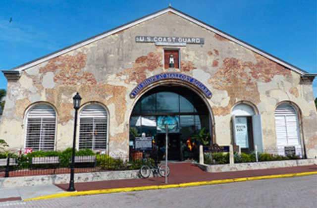 old industrial building with coast guard sign at mallory square market key west