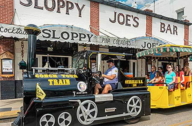 train tram parked at sloppy joes at conch tour train key west