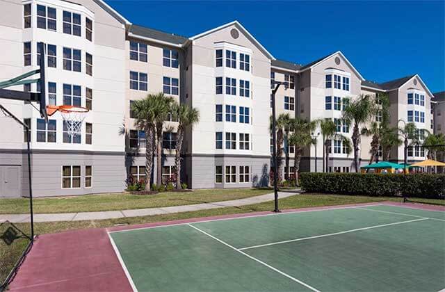 basketball court near pool area and hotel at homewood suites by hilton orlando nearest to universal studios