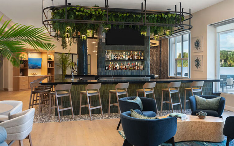 chic interior bar and lounge at delta hotels by marriott west palm beach