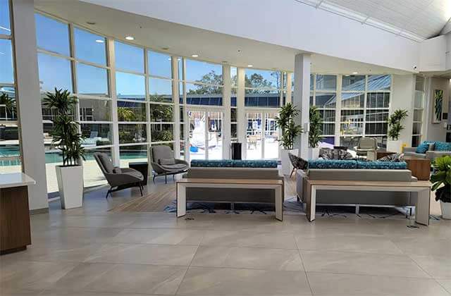 conference center lobby with vaulted windows and lounge seating at wyndham orlando resort and conference center celebration area