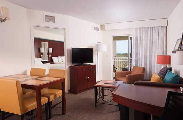 hotel suite with separate living room and bedroom at residence inn fort myers sanibel