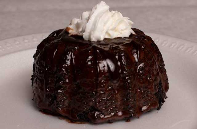 chocolate molten lava cake dessert with fudge syrup and whipped cream at the juicy crab orlando