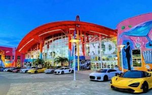 front entrance with several exotic sports cars at dezerland park orlando florida auto museum for james bond collection now open