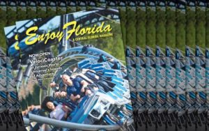 stack of enjoy florida magazine covers with riders on a blue swirling roller coaster on jurassic world veloci-coaster at islands of adventure universal orlando resort