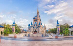 cinderella castle at magic kingdom with main street usa against cloudy sky walt disney world resort feature