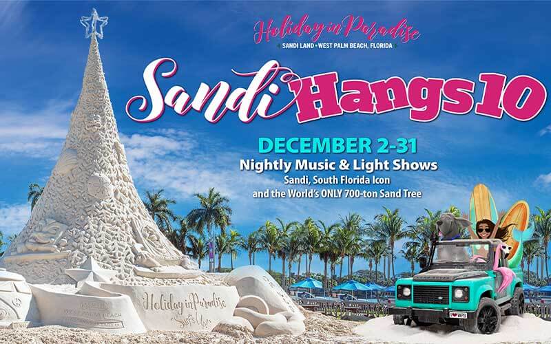 photo of clear blue sky with green palm trees in the background with a teal jeep with a cartoon woman, surfboards, flamingo wearing sunglasses and large grey dog in it in front of picnic tables next to a 700 pound sand sculpture shaped like a christmas tree with intricate carvings with the text over it holiday in paradise sandi. land west palm beach florida sandi hangs 10 december 2-31 nightly music & light shows sandi, south florida icon and the world's only 700-ton sand tree